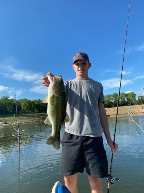 Corey bass fishing on pond