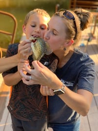 Child-n-woman-kissing-crappie