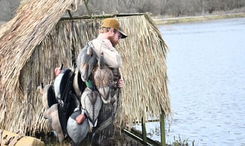 hunter with duck decoys