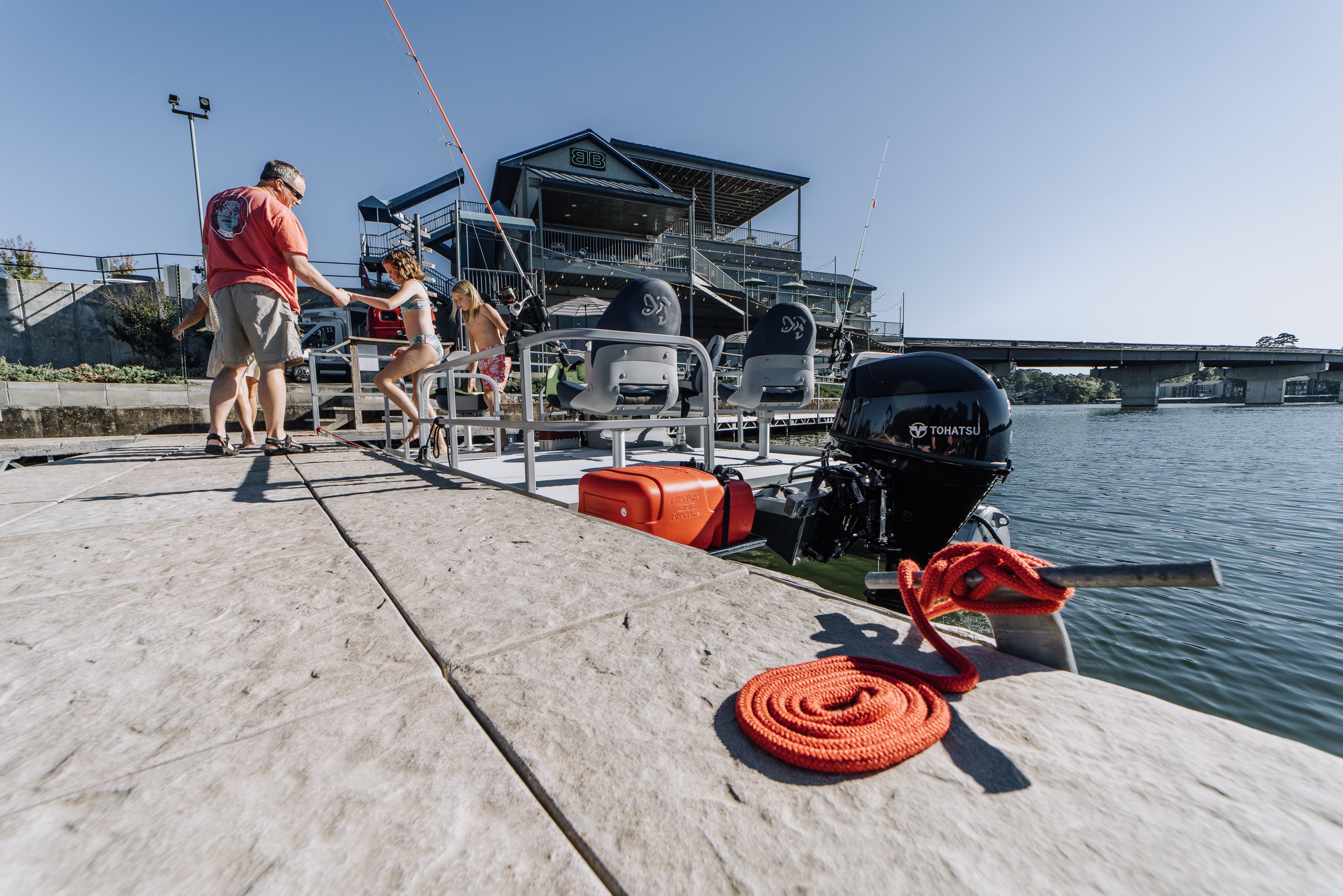 stepping-from-boat-to-floating-dock