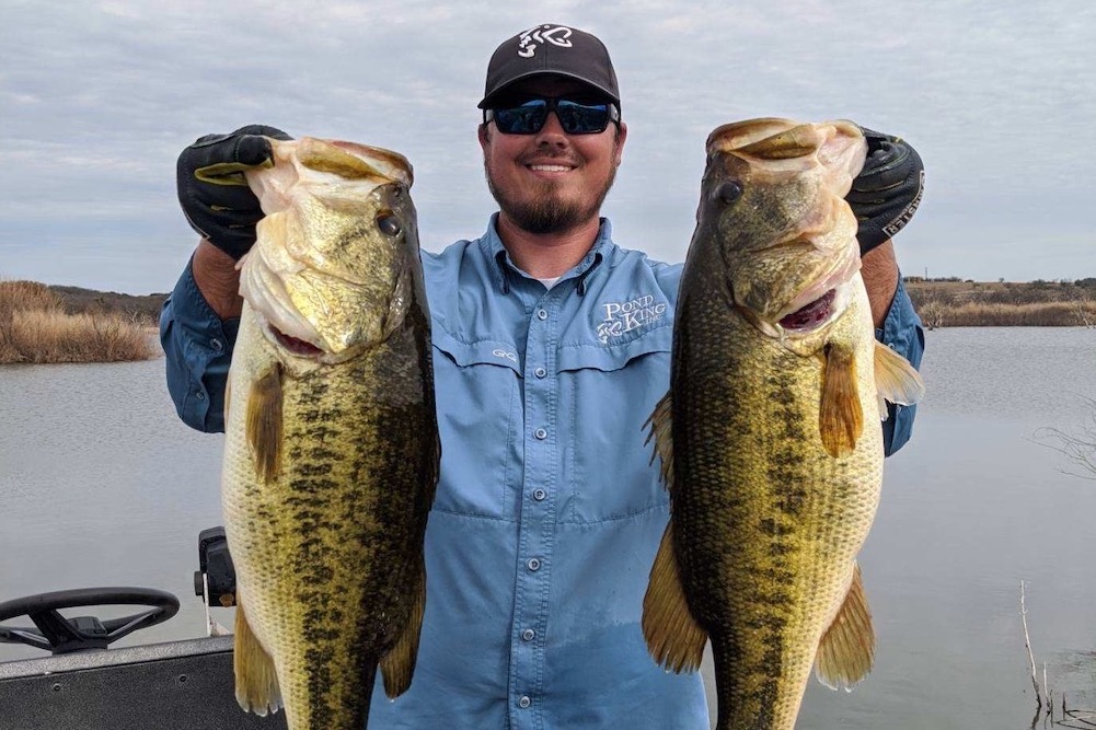 Ethan Stokes with two monster bass