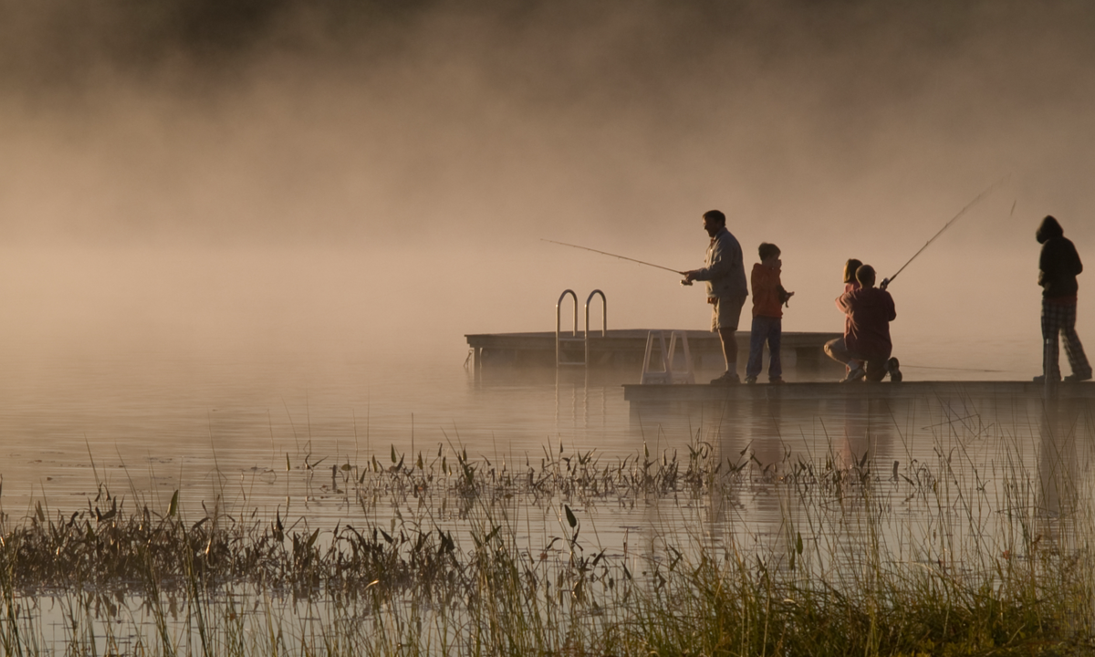 Family Fishing on a Dock